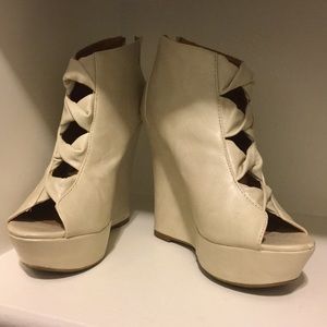 Cream colored, comfy wedges!